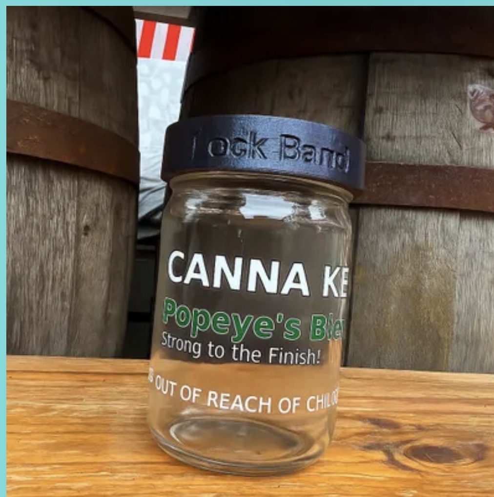 Mason jar labeled "Canna" with black lid