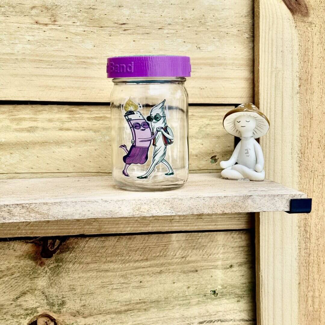 Jar with dancing character stickers and figurine