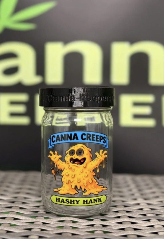 Small glass jar with Canna Creeps label