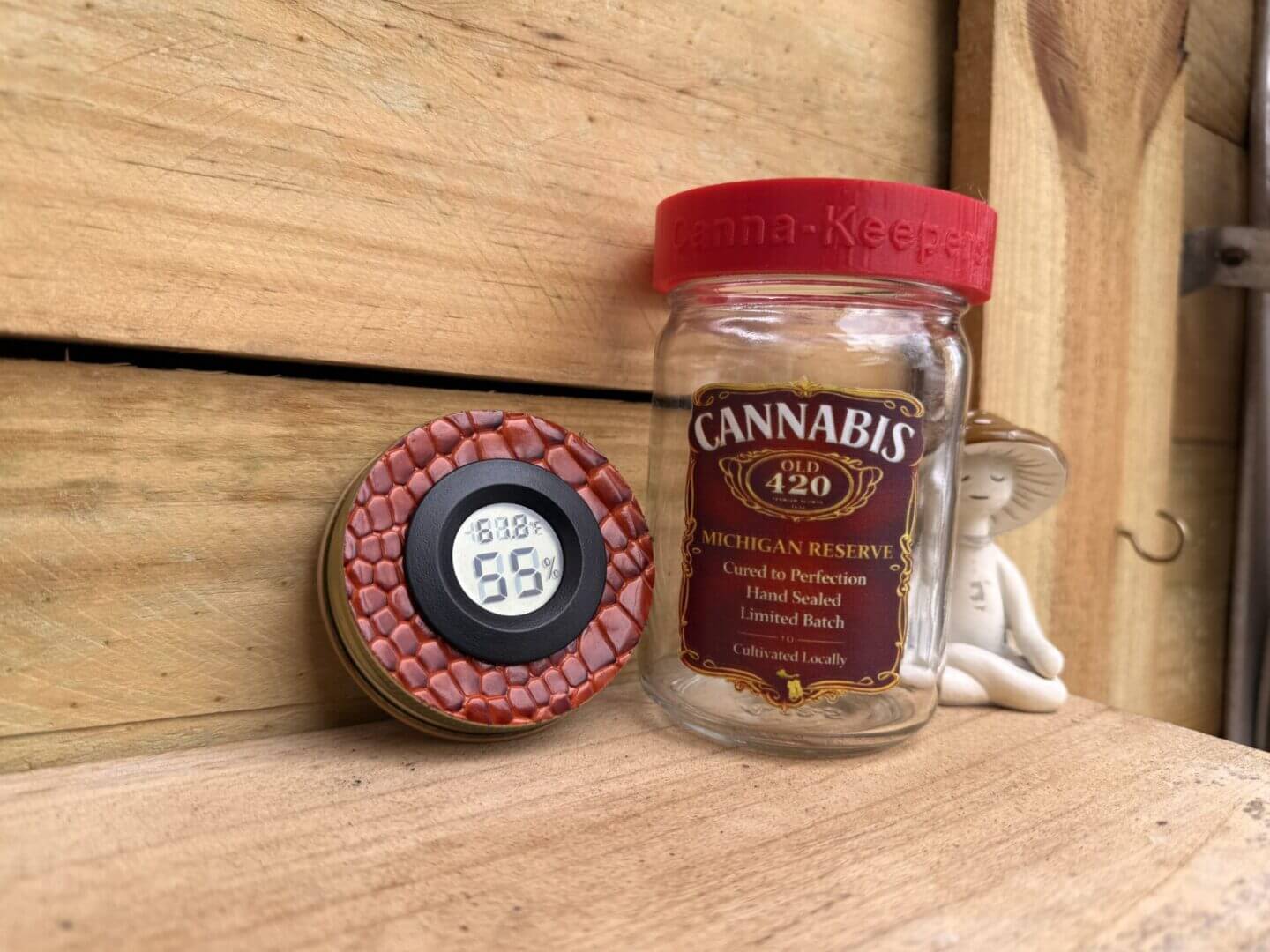 Cannabis jar with red lid and hygrometer