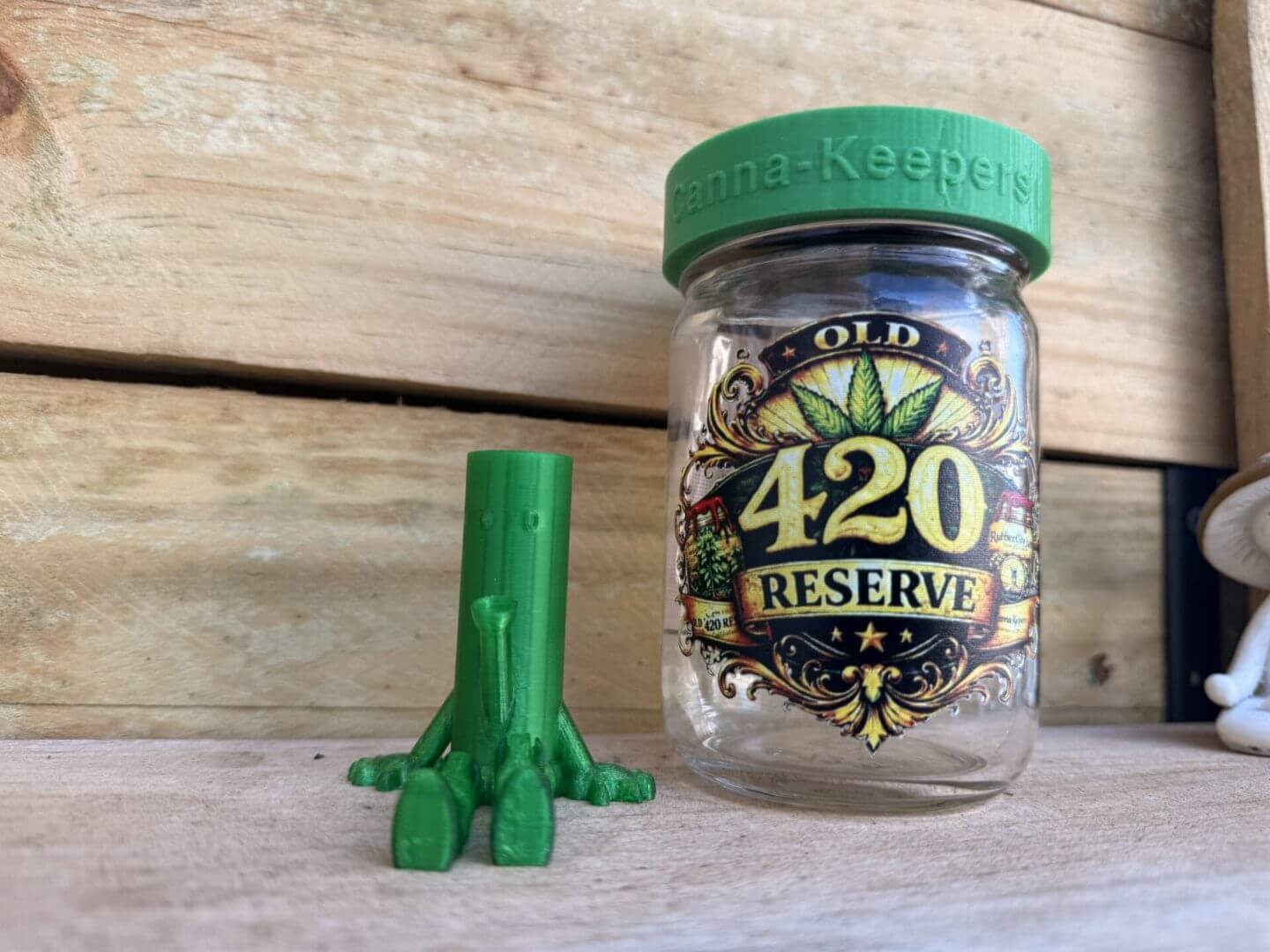 Glass jar labeled 420 Reserve with green lid