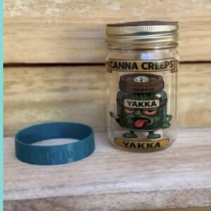 Glass jar labeled Canna Creeps Yakka